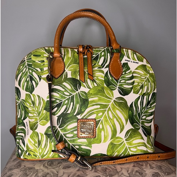 Dooney and Burke purse, palm leaves in good condition. Lightly used. - Picture 1 of 4